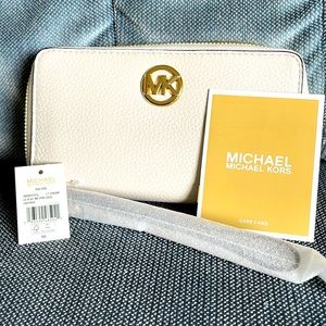 Brand New! Michael Kors phone case wallet/wristlet.